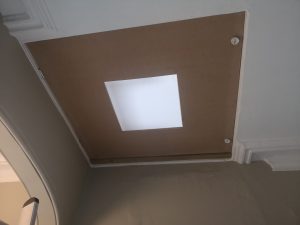 Opaque Perspex window in loft hatch.